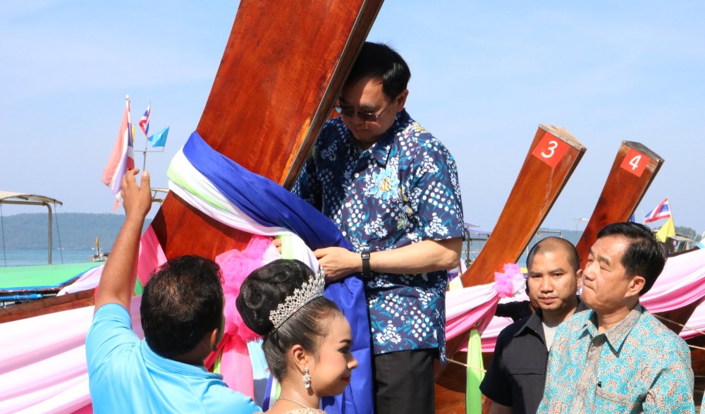 ประเพณีผูกผ้าเรือหัวโทง