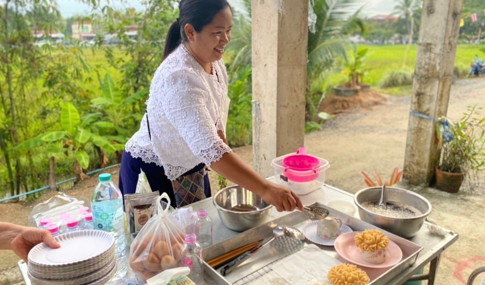 กิจกรรมประเพณีให้ทานไฟ
