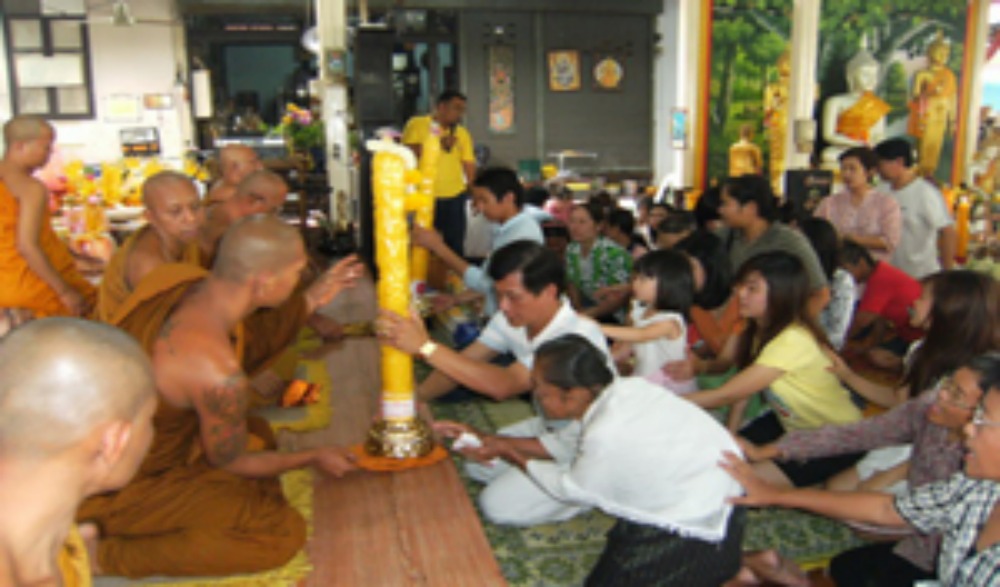 ประเพณีฮีตสิบสองคองสิบสี่(บุญเข้าพรรษา)