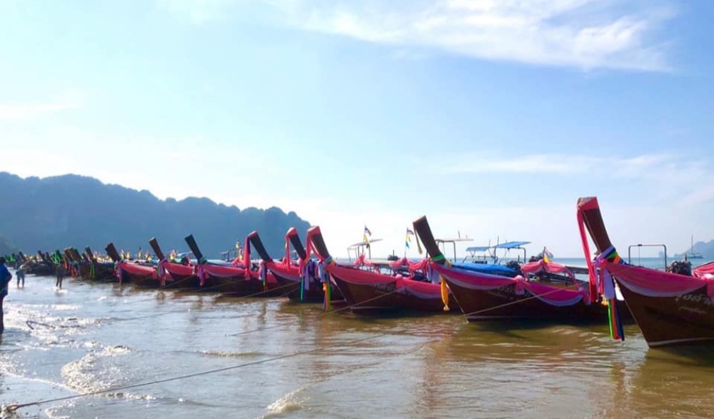 ประเพณีผูกผ้าเรือหัวโทง